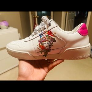 Brand new versace Medusa sneakers.Comes with box , dust bag and warranty card